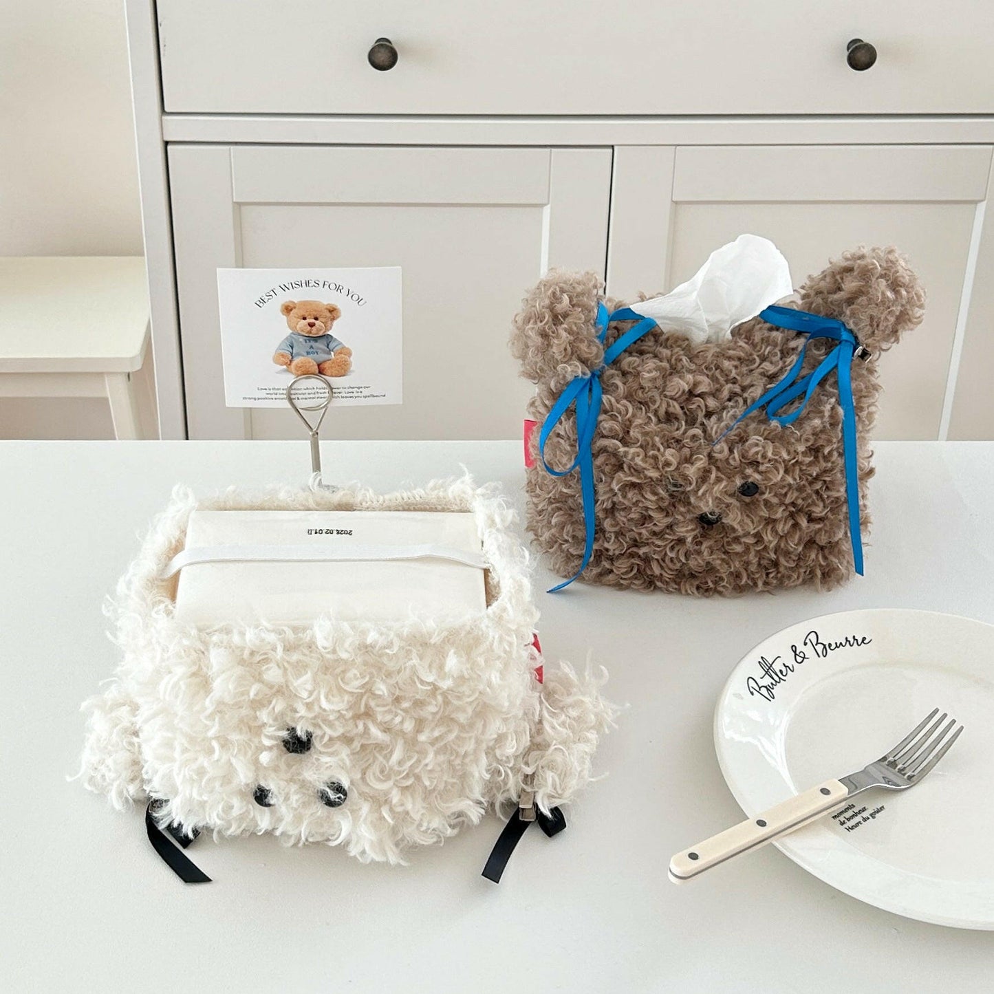 Plush puppy tissue box cover on table