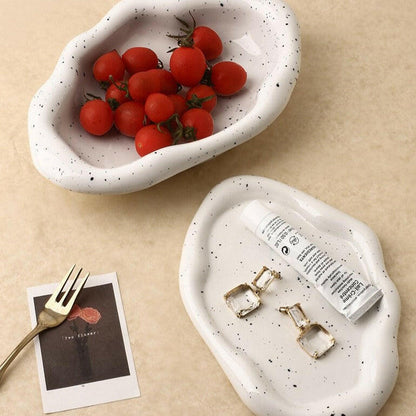 Speckled irregular ceramic tray with fruit