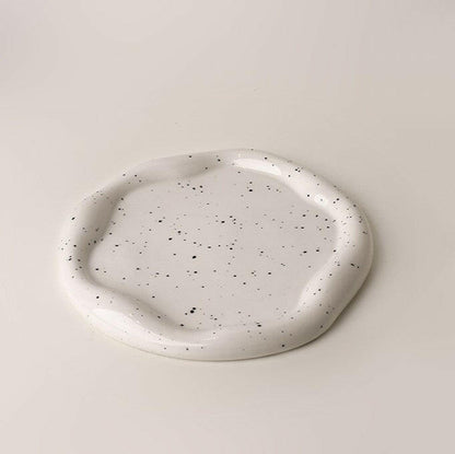 Speckled round ceremic tray
