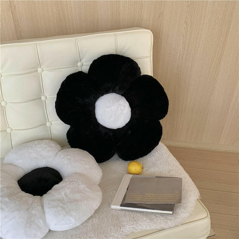 black flower shaped cushion