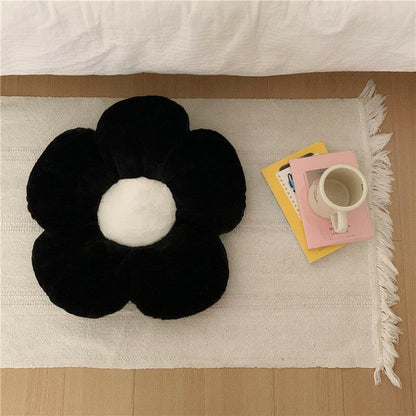 black flower shaped cushion